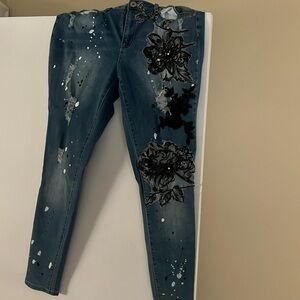 Distressed women’s jeans